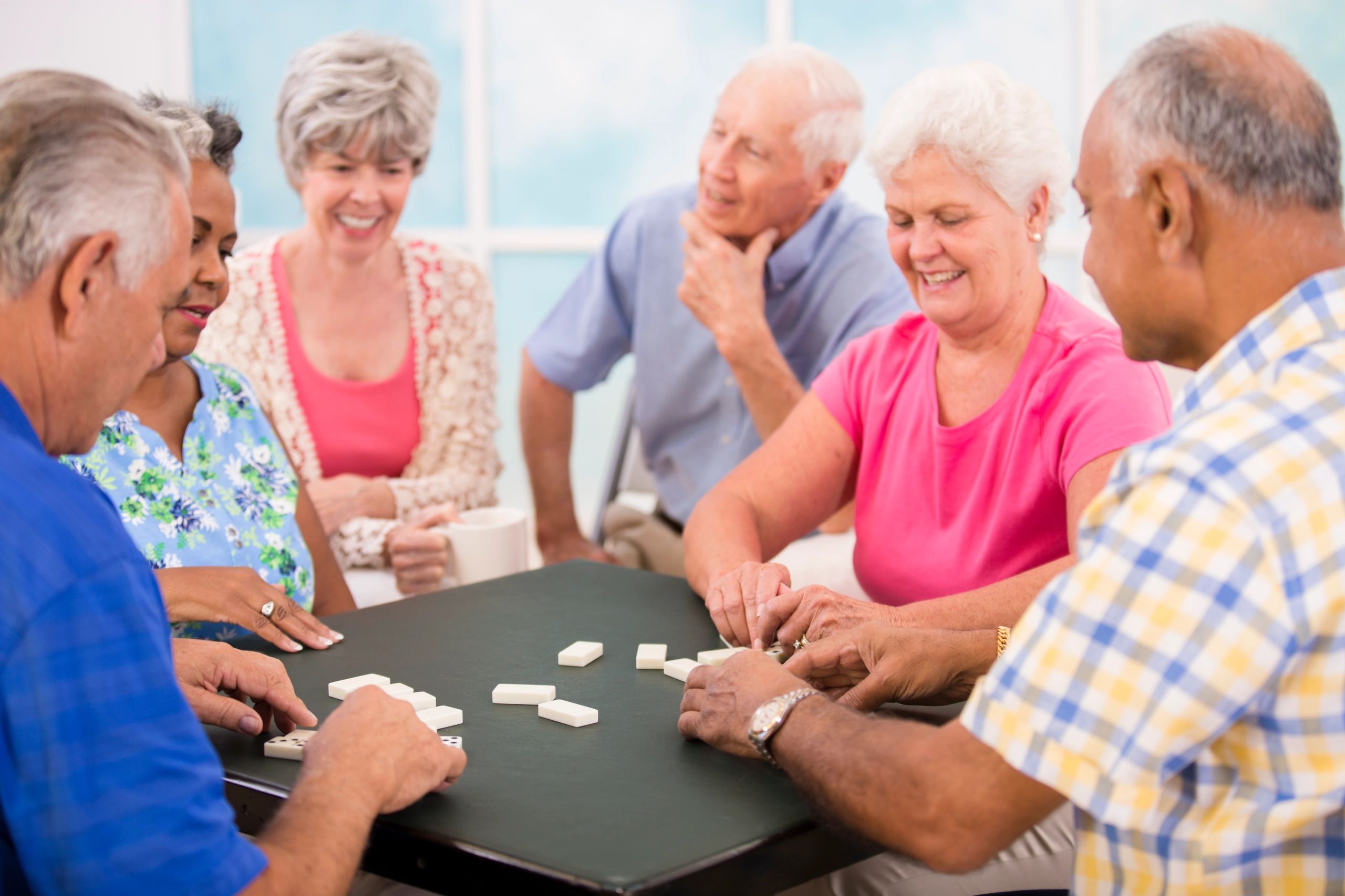 Group of friends enjoying a tabletop game together
